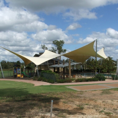 Commercial pool shade sail covering pool and playground by Shade To Order Newcastle, Maitland, Sydney