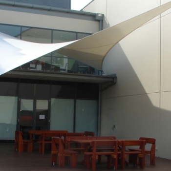Waterproof shade sail for commercial building by Shade to Order Newcastle Sydney NSW Australia