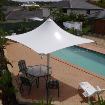 Umbrella sail for pool area by Shade to Order, Gateshead NSW